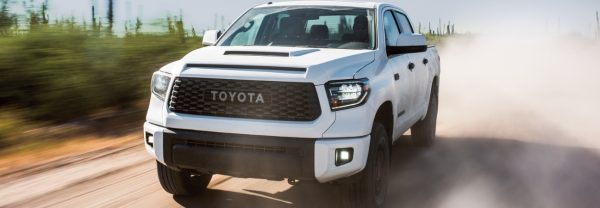 2019 Toyota Tundra driving down dusty road