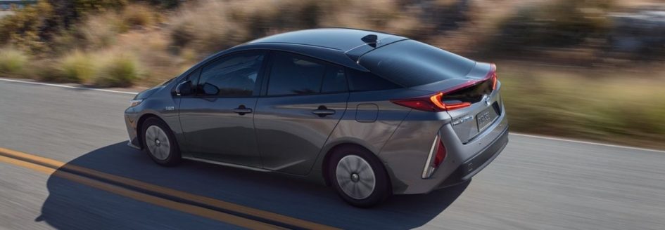 2020 toyota prius driving through the country side